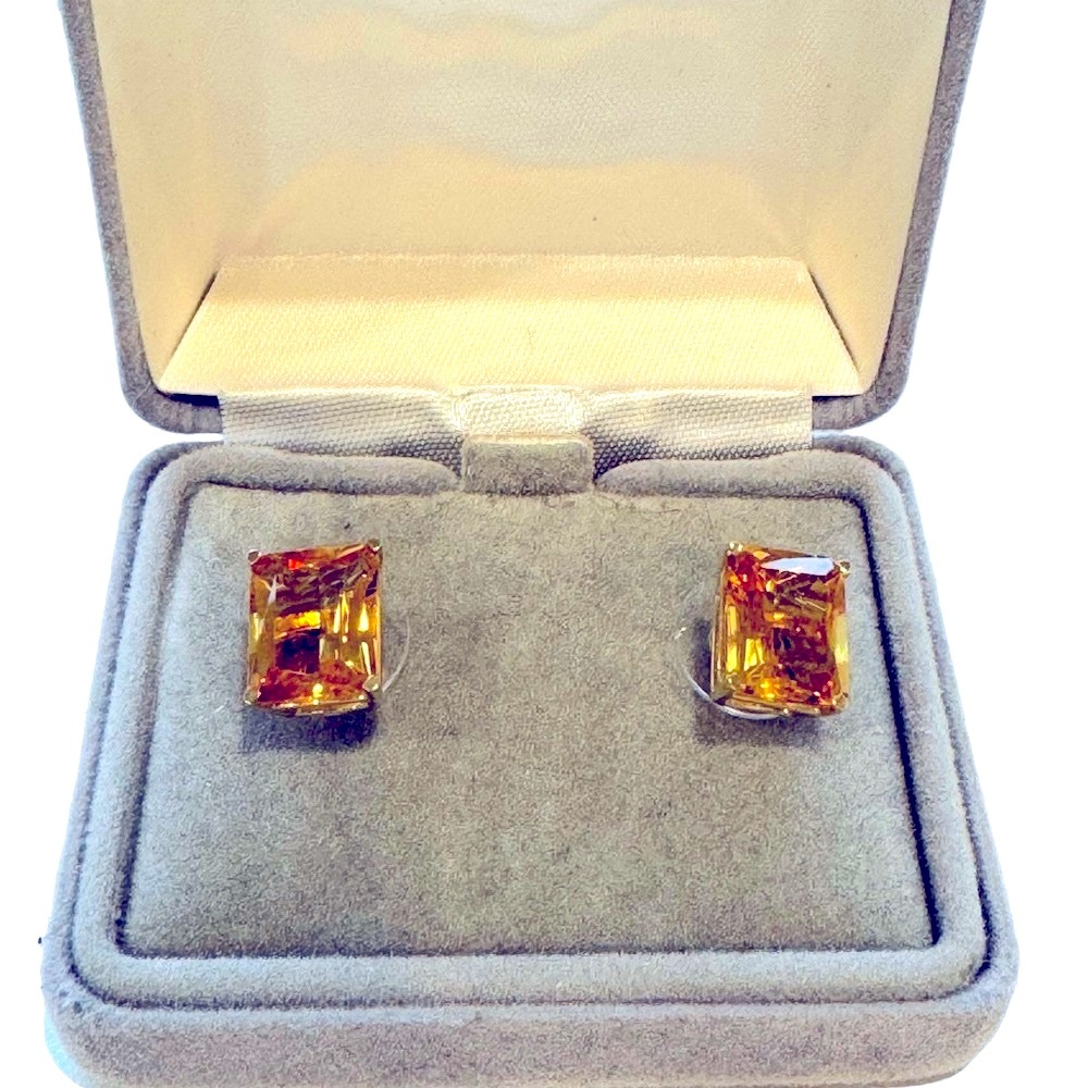 Emerald cut citrine stud earrings set in 14 karat gold. NWT